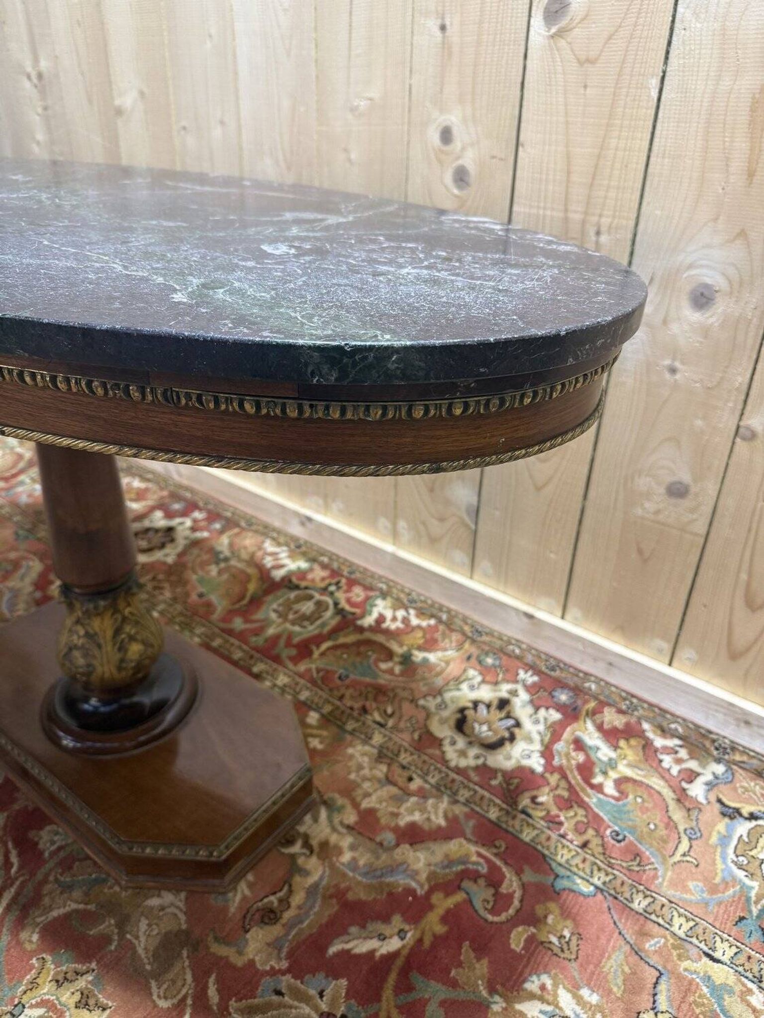 Oval Empire-style gueridon in walnut and marble.