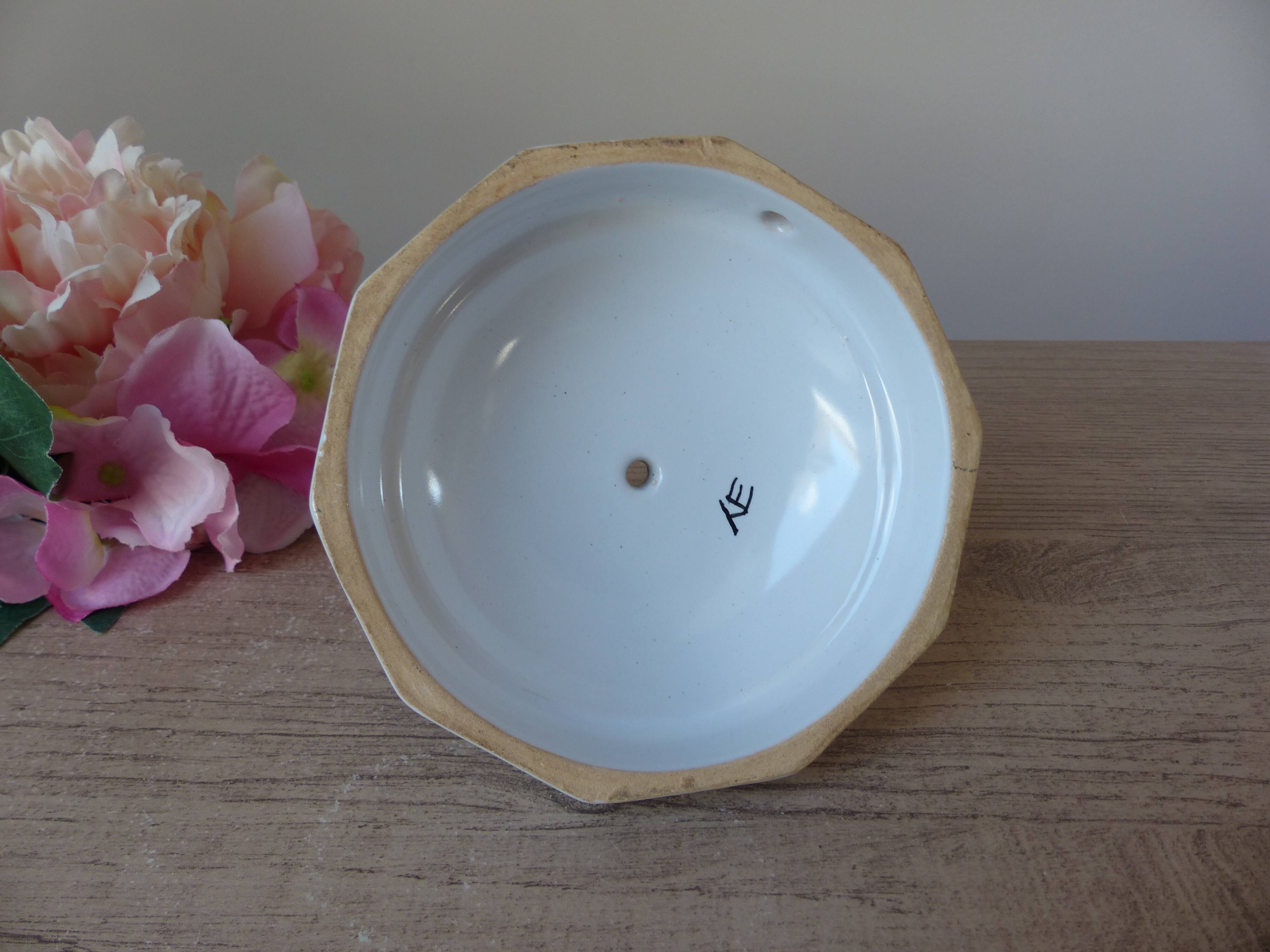 Malicorne earthenware candle holder by Emile Tessier with floral decoration