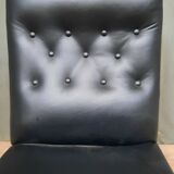 Pair of upholstered low chairs without arms