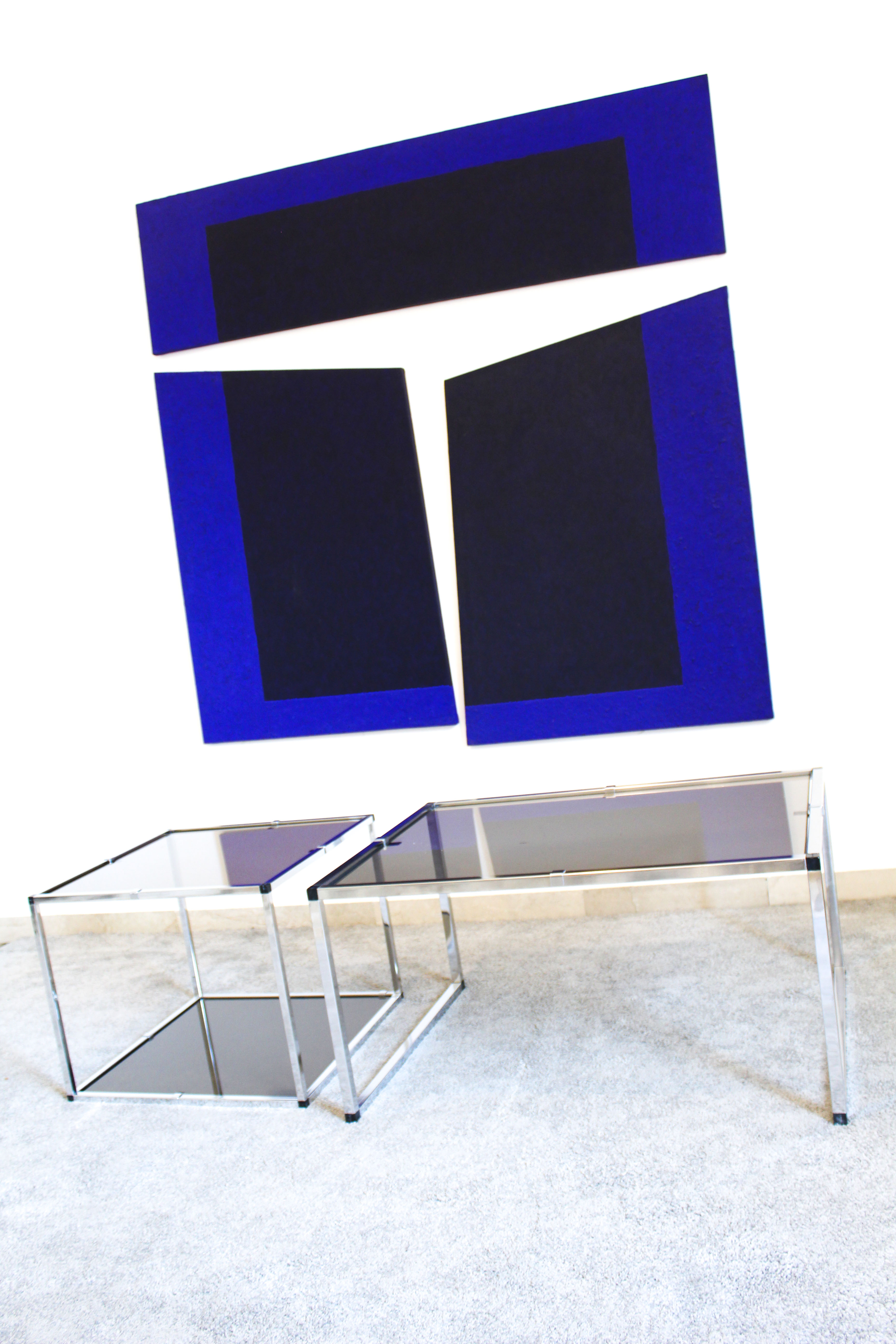 Pair of Coffee Tables in chromed metal and smoked glass, Italy 70's