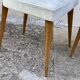 Pair of vintage 1960s compass-legged chairs in wood and white imitation leather
