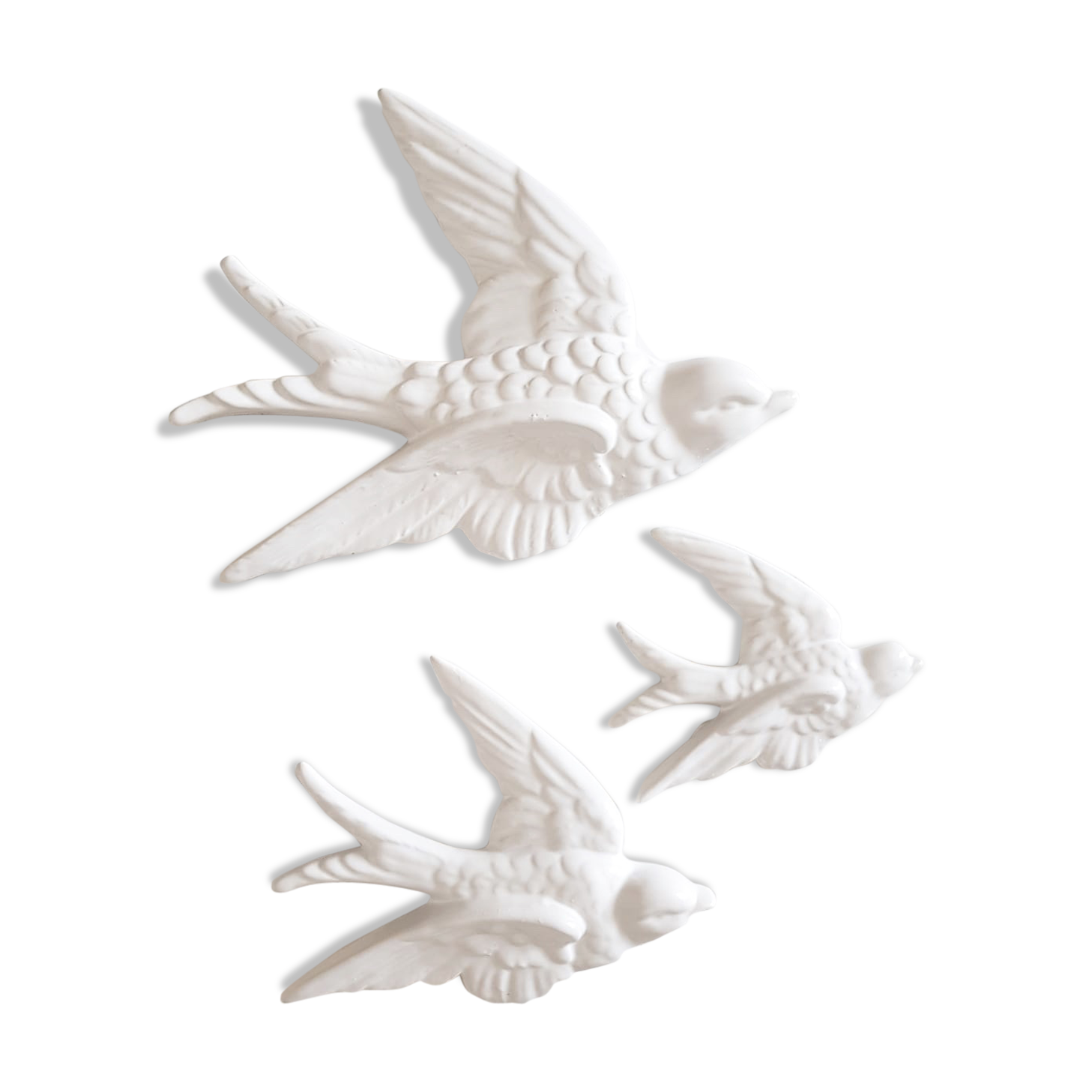Set of three swallows in white earthenware
