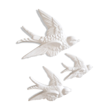 Set of three swallows in white earthenware