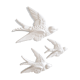 Ensemble de trois hirondelles en faïence blanche