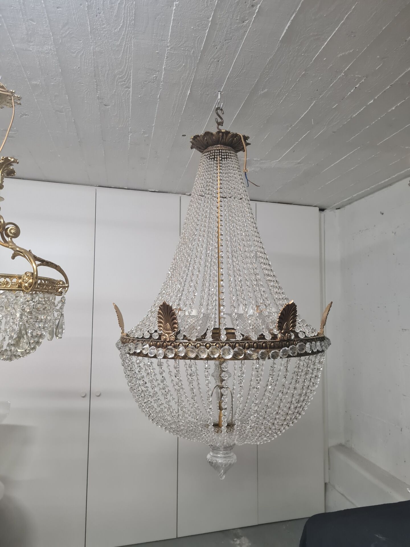 Large chandelier from the late 19th century in crystal and bronze.