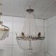 Large chandelier from the late 19th century in crystal and bronze.