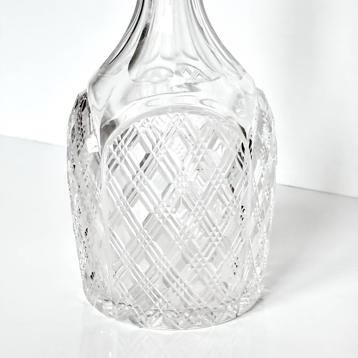 English carafe in crystal and silver