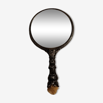 Beveled hand-faced mirror in silver metal