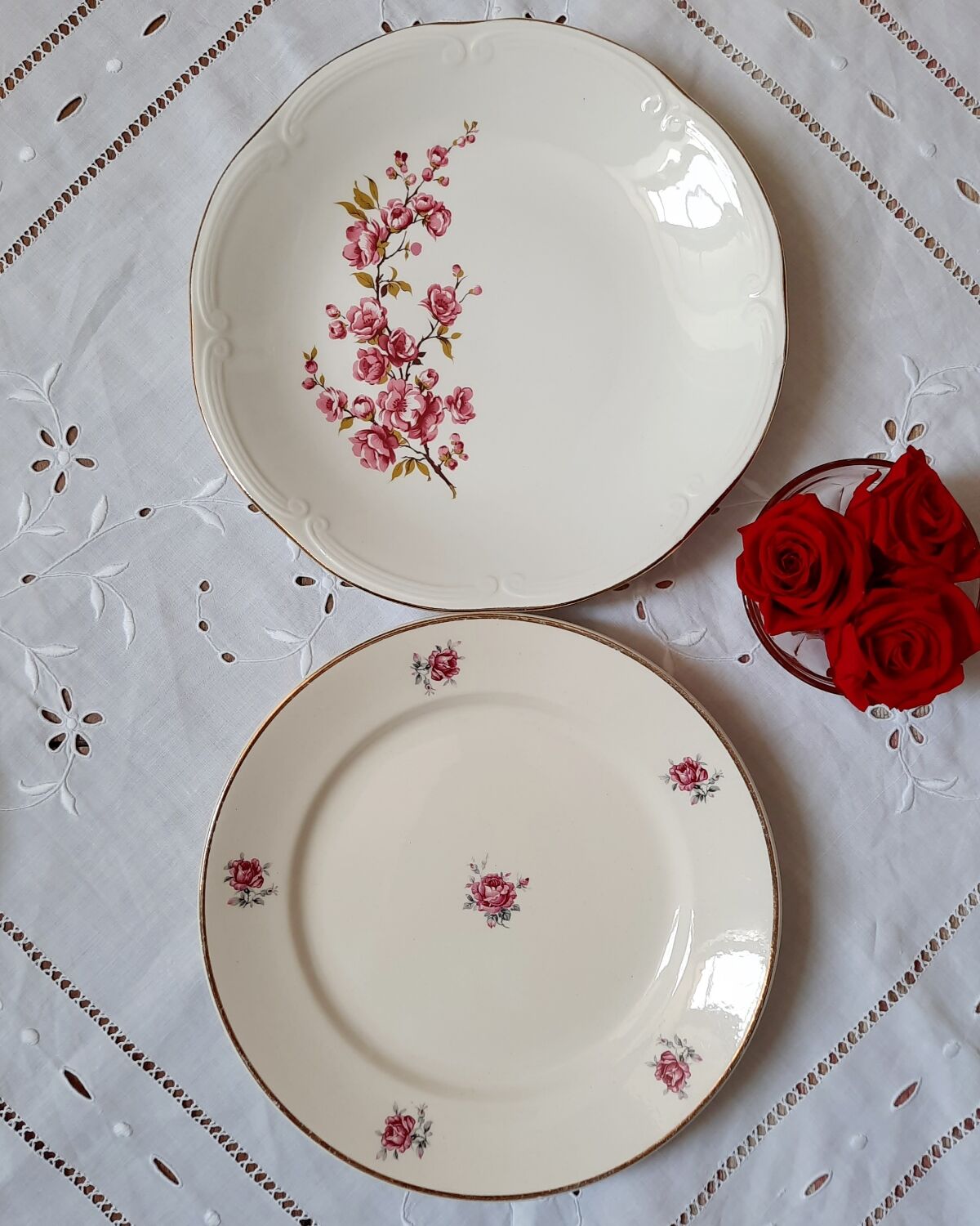 Flat antique earthenware plates with gilded edges