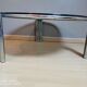 Table basse verre fumé et pieds chromés