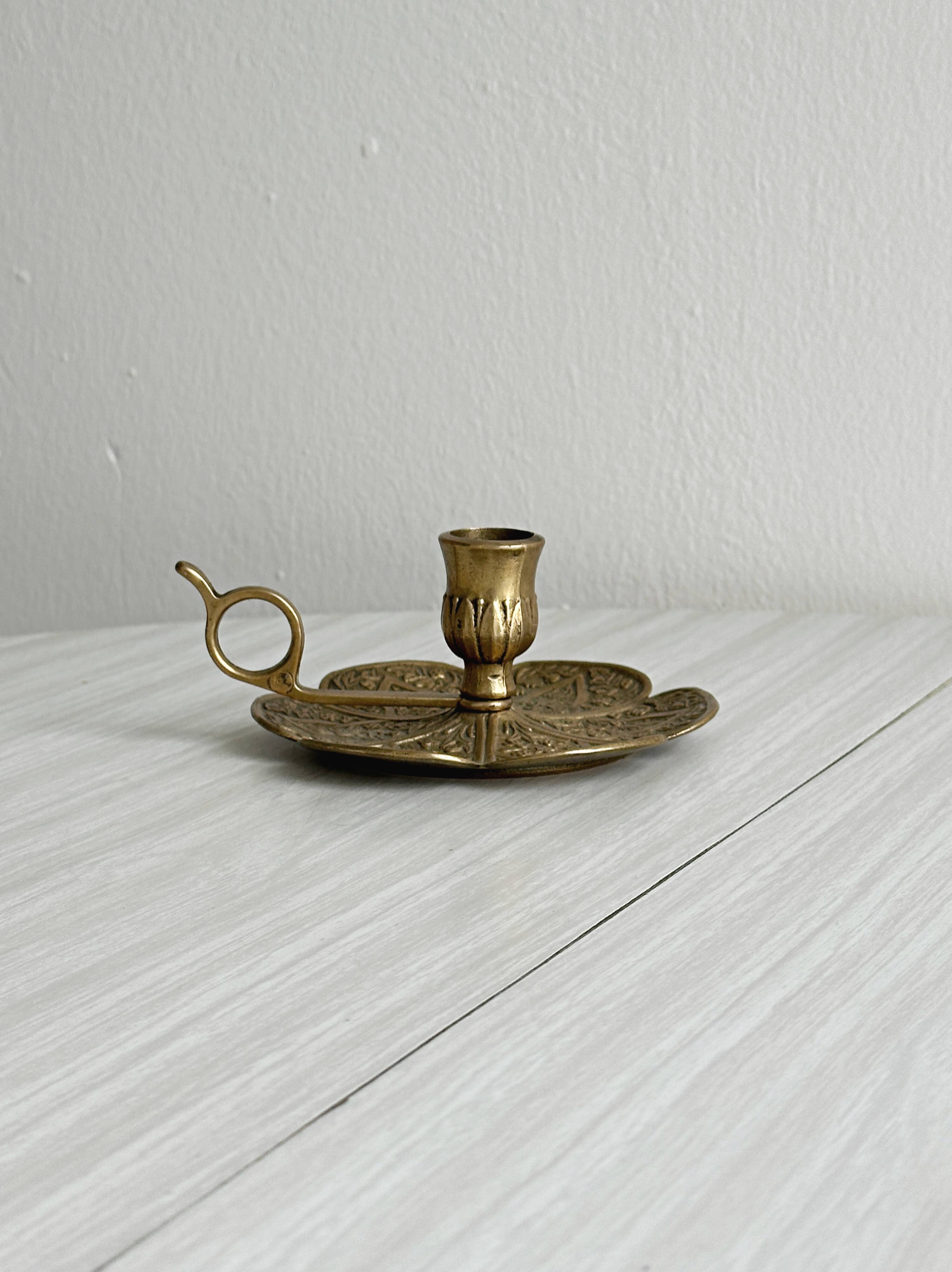 Brass candlestick with handle