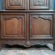 Buffet with 2 bodies in carved oak, Louis XV style, 19th century.