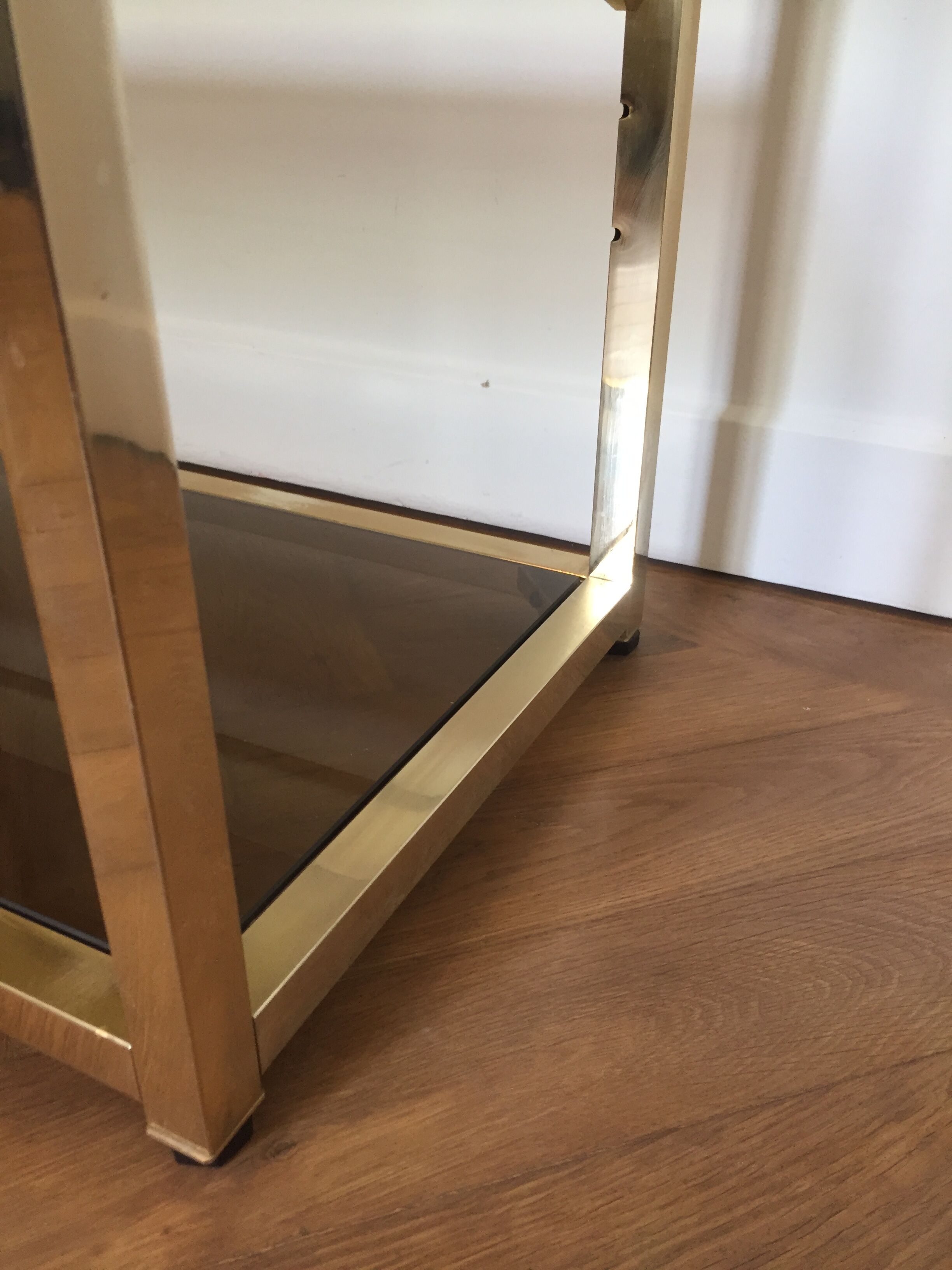 Pair of consoles brass shelves and smoked glass design Roche Bobois