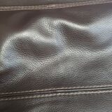 Dark brown leather armchair from steiner by designer pascal daveluy model ranelagh