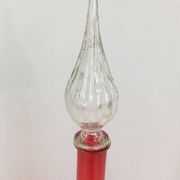 Large designer bottle in red glass