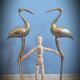 Duo brass herons