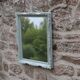 Vintage wall mirror in carved blue-green wood – rococo style – H48 cm