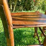 bistro chairs with pattern on the seat