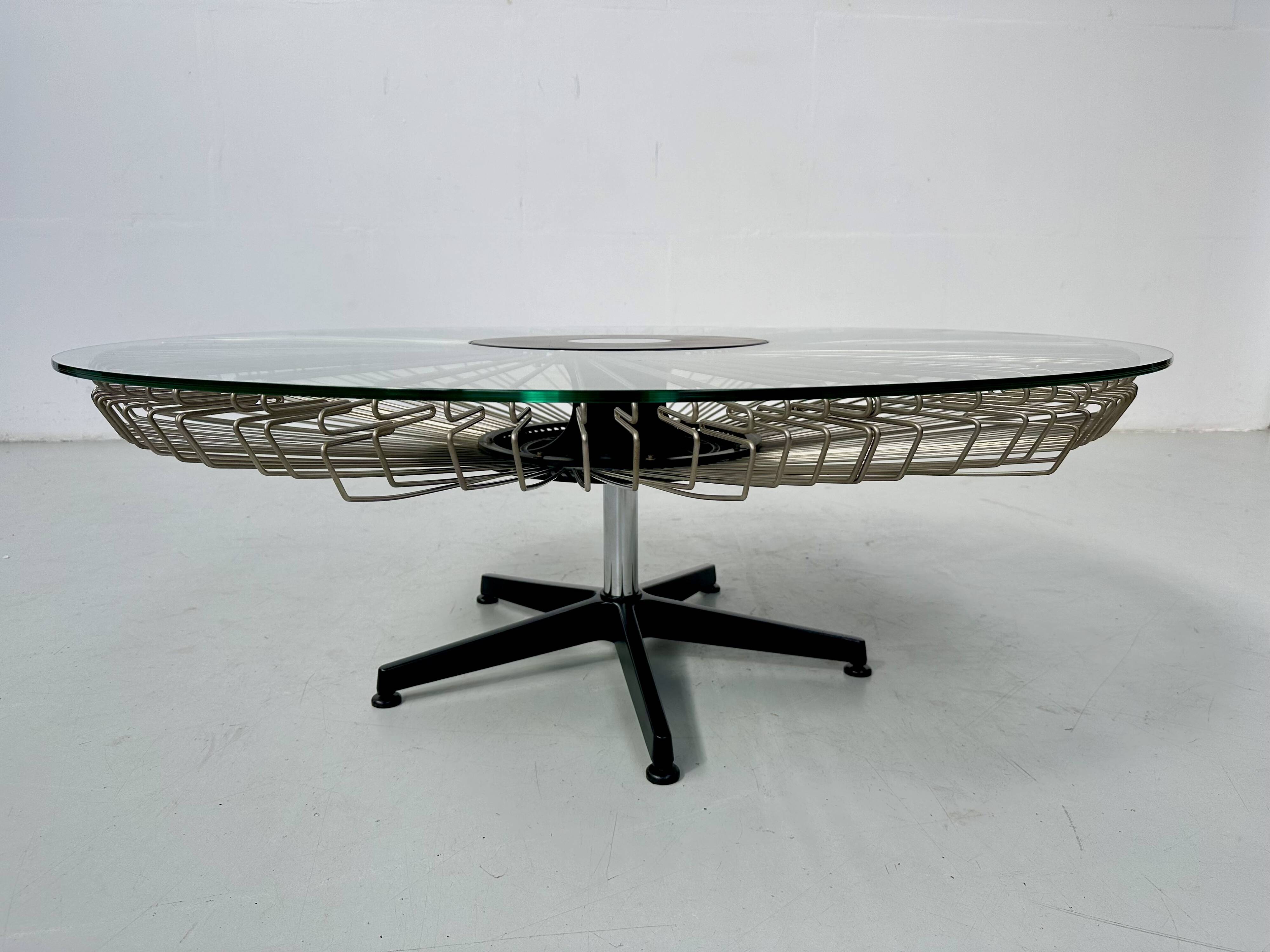 Italian rotating glass and metal coffee table designed for Prada, 1990s.