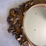 Miroir rond en bois sculpté