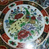 Chinese dish decorated with peacocks and plants