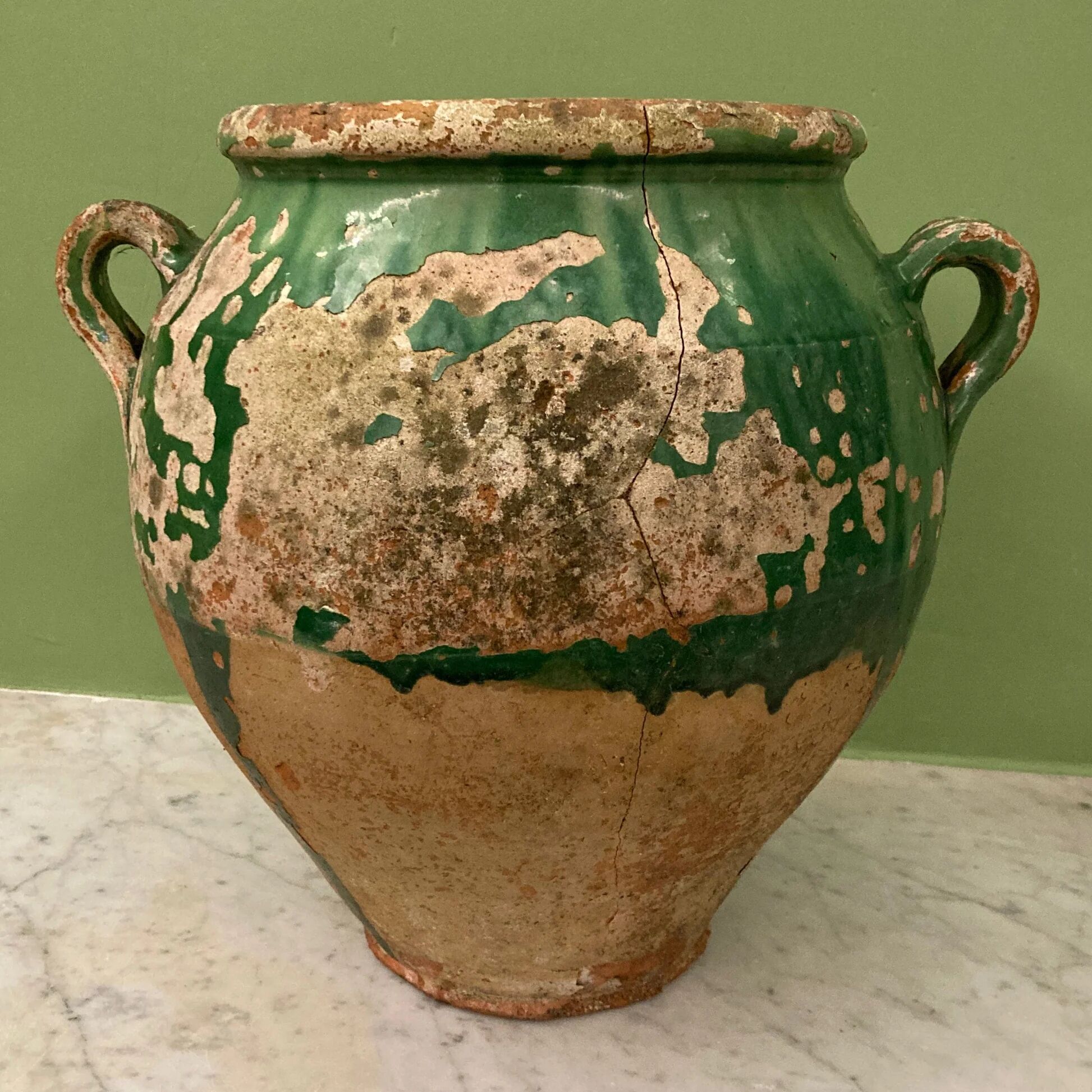 19th-century confit pot. Glazed green terracotta.