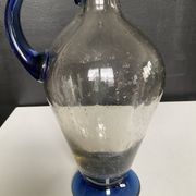 Vintage carafe in blown and bubbled glass paste.