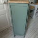 Vintage shoe cabinet smoked green wax finish, wooden top.