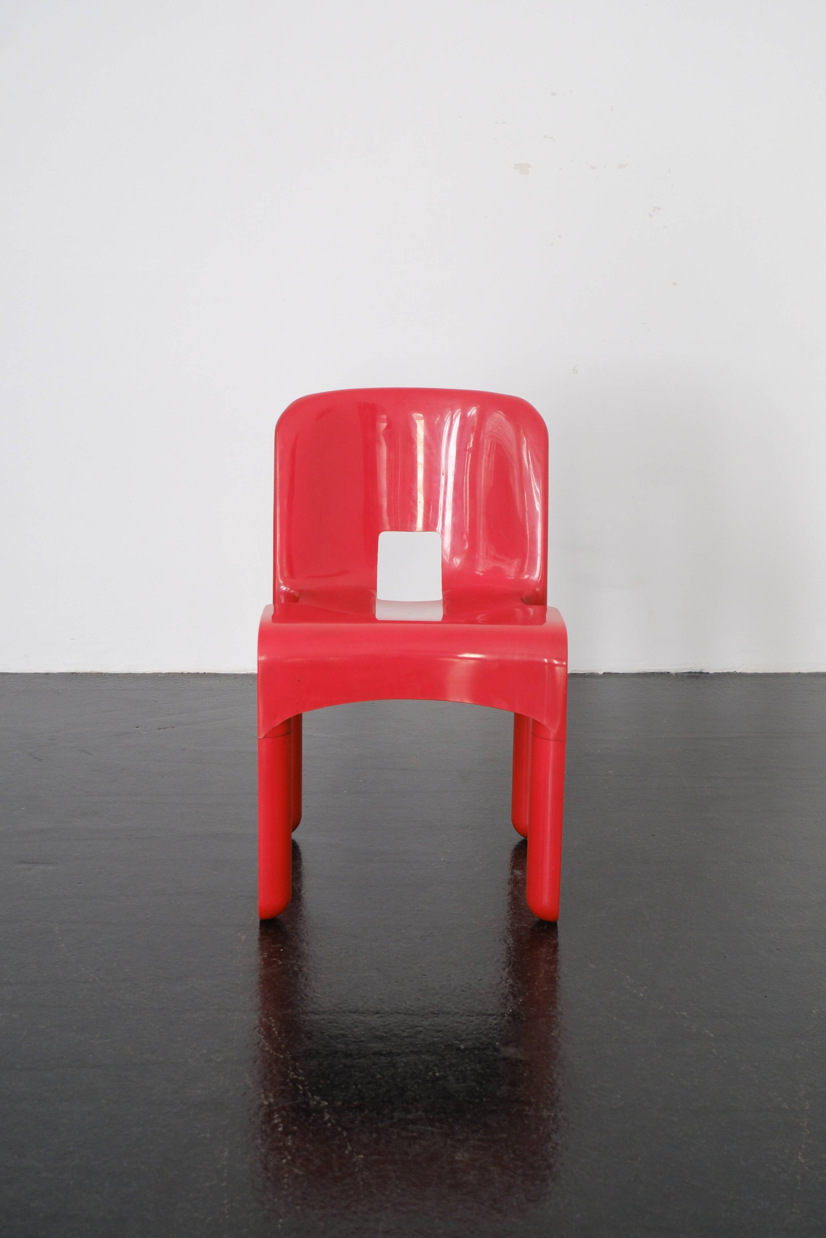 Red "Universale" chair by Joe Colombo / Kartell