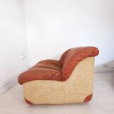 Four vintage armchairs, leather and fabric, 70s