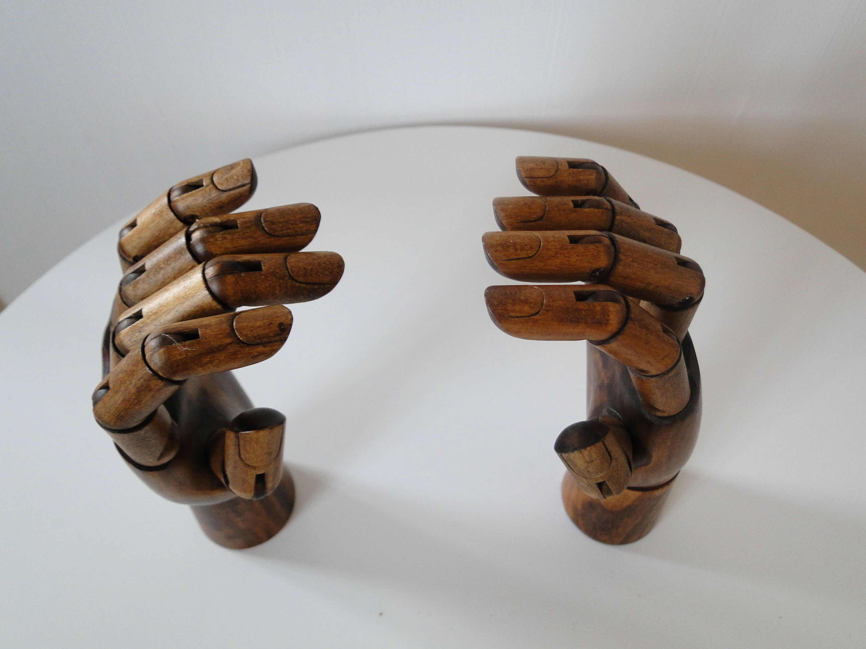 Pair of articulated wooden hands