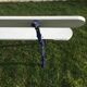 Old wooden garden bench and vine cast iron foot