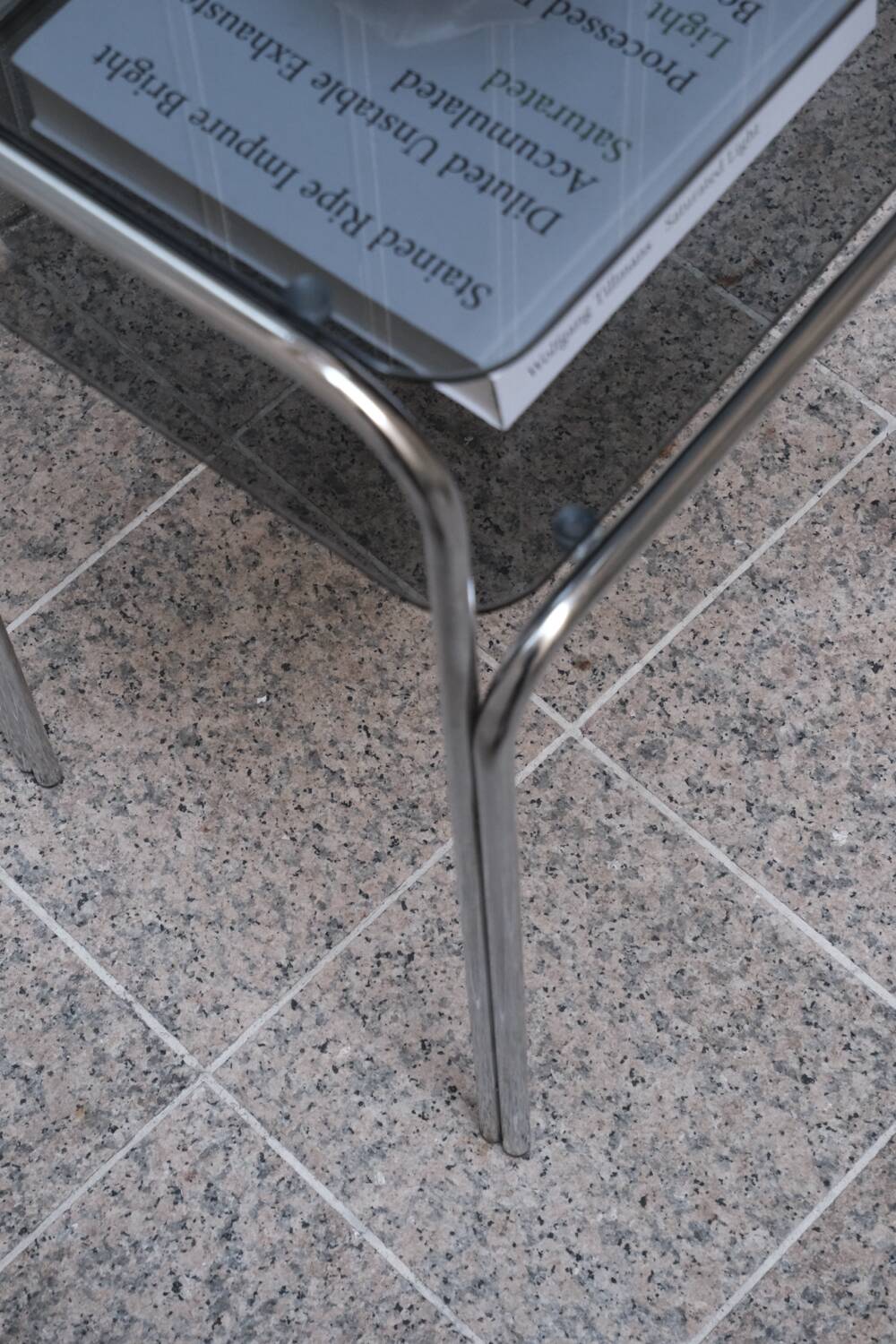 Vintage side table in smoked glass and chromed metal – 70s