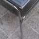 Vintage side table in smoked glass and chromed metal – 70s