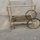 Vintage brass service 4 wheels