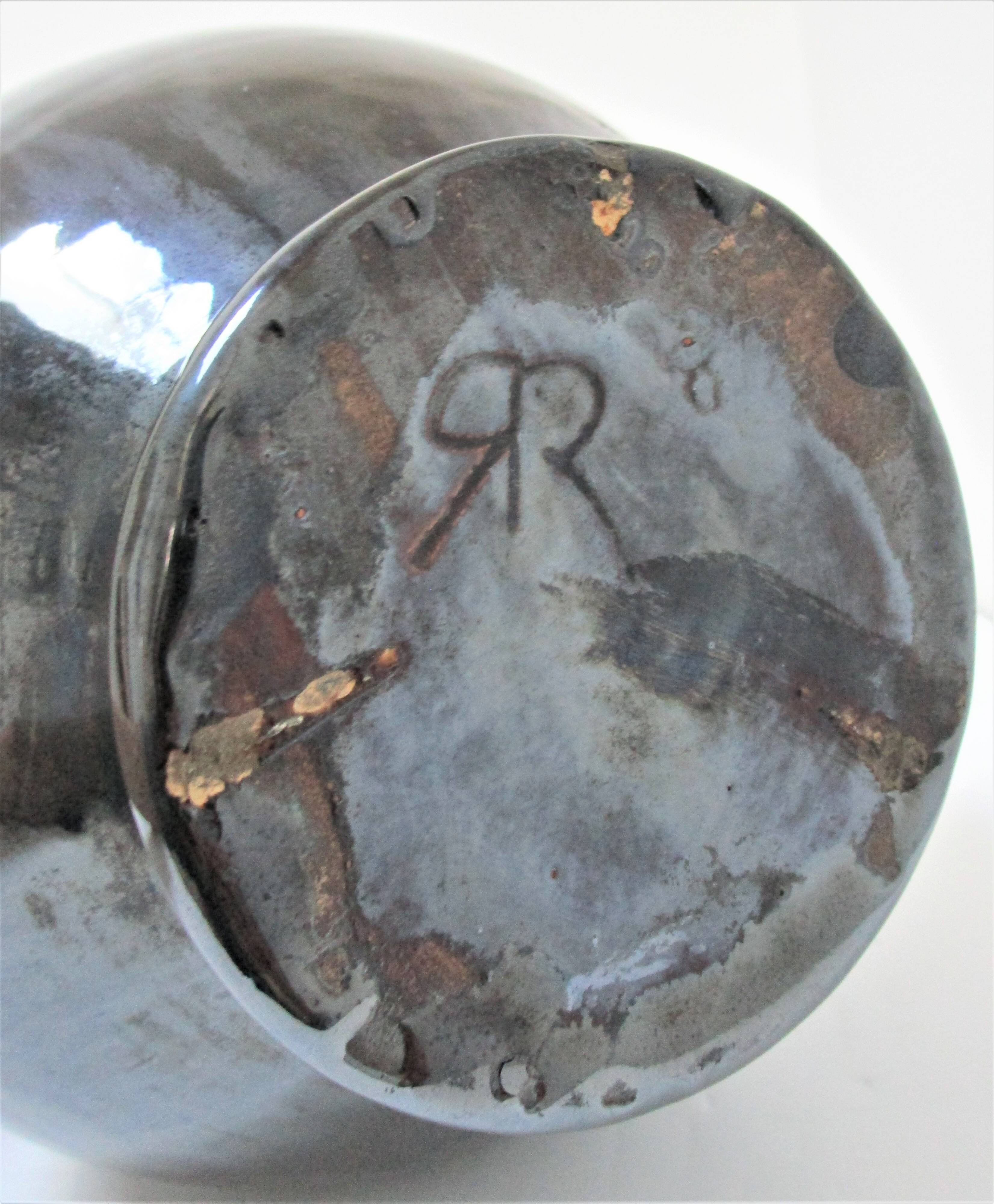 Black pearl glaze ceramic pitcher by Reinhold Rieckmann signed