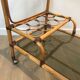 Rattan rolling table and leather ties