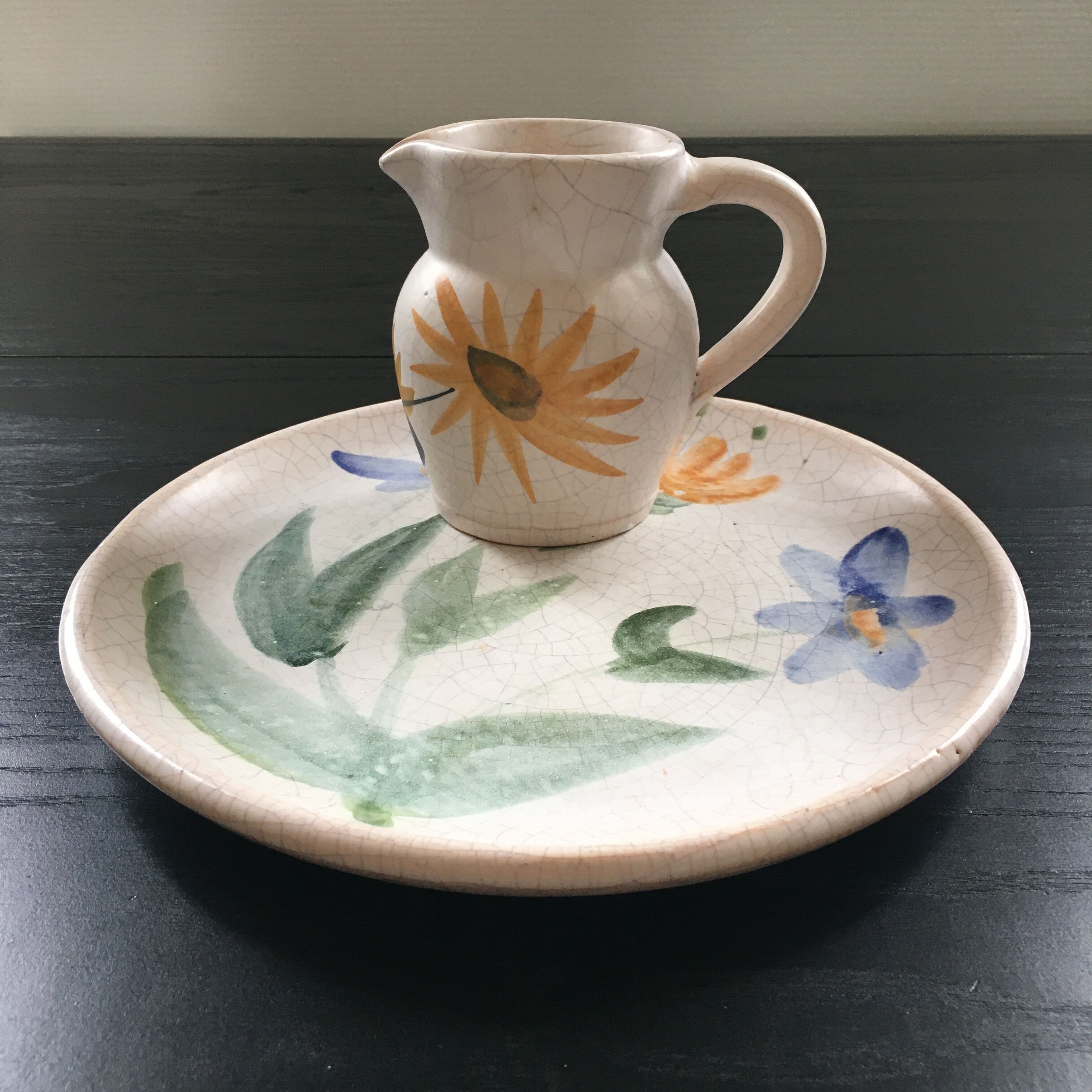 Set plate and jug with floral decoration.