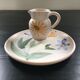 Set plate and jug with floral decoration.