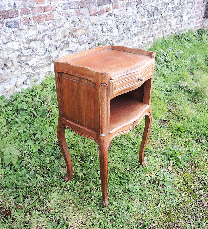 Old wooden bedside table Louis XV style