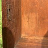 Old carved wooden medicine cabinet with beveled mirror
