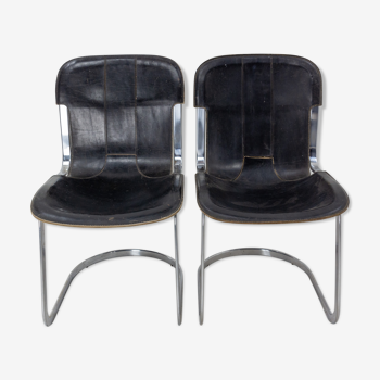 Pair of windmill leather chairs