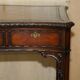 WARING & GILLOW library desk in the style of Thomas Chippendale with a leather top.
