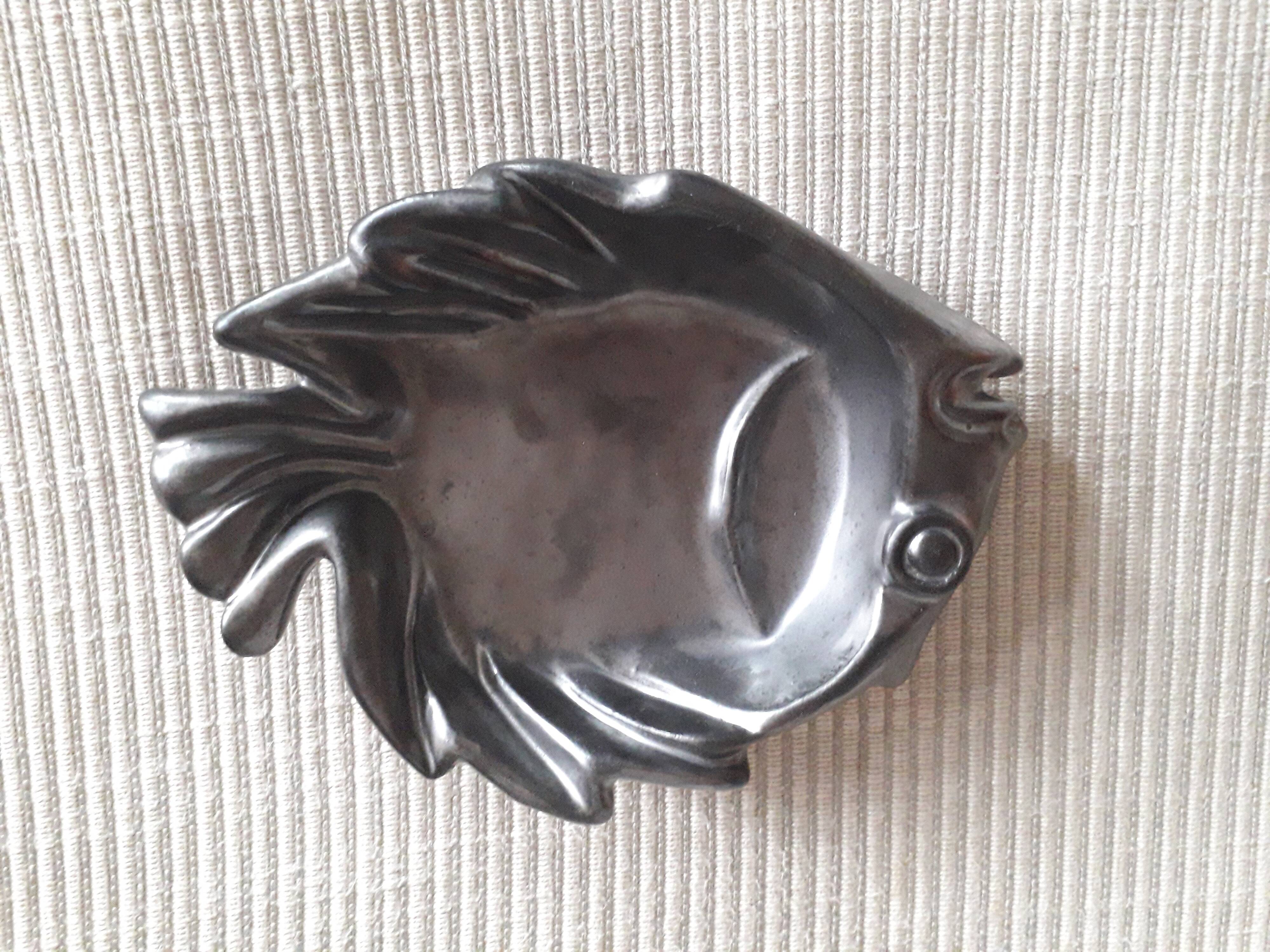 Vallauris fish-shaped pocket emptier