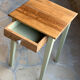 Restored antique oak bedside table - almond green and natural varnished wood