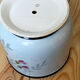 Lot de deux cache-pots en porcelaine de Limoges