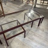 Burgundy lacquered metal, brass and beveled glass nesting tables, France 1950s