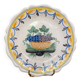 Faience dish of eighteenth-century style nevers decorated with basket with bunches of grapes