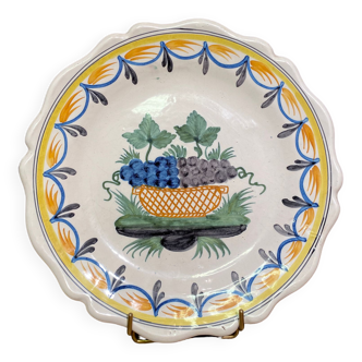 Faience dish of eighteenth-century style nevers decorated with basket with bunches of grapes