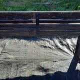 Public bench in wooden slat and cast iron